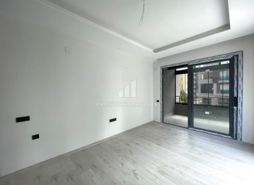Новая квартира 2+1, 100м², с огромной террасой в газифицированном комплексе в Тедже, Мерсин ID-13640 фото-7