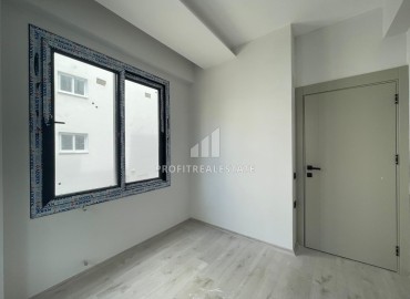Новая квартира 2+1, 100м², с огромной террасой в газифицированном комплексе в Тедже, Мерсин ID-13640 фото-11