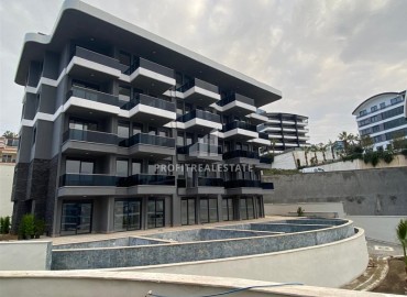 Новая двухкомнатная квартира в Каргыджаке, в благоустроенной резиденции 2022 года, Аланья, 55 м2 ID-13643 фото-1