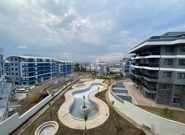 Новая двухкомнатная квартира в Каргыджаке, в благоустроенной резиденции 2022 года, Аланья, 55 м2 ID-13643 фото-9