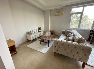 Меблированная двухкомнатная квартира, 55м², в уютной резиденции, в 350м от моря в районе Алании Тосмур ID-13650 фото-2
