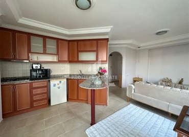 Меблированная двухкомнатная квартира, 55м², в уютной резиденции, в 350м от моря в районе Алании Тосмур ID-13650 фото-5