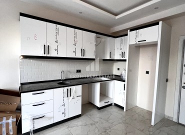 One-bedroom apartment 52 m2, unfurnished, in a residence with facilities, in Oba, Alanya ID-11332 фото-2