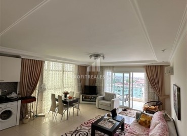 Меблированные двухкомнатные апартаменты, 70м² в элитном комплексе района Оба, Алания ID-13666 фото-1