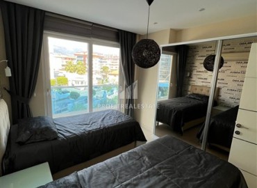 Stylish two bedroom apartment 111 m2, with a designer interior, 50 meters from the sea, Tosmur, Alanya ID-13693 фото-15