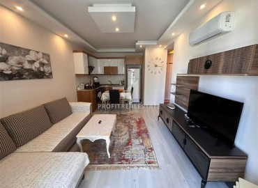 Меблированная двухкомнатная квартира 50м2, с застеклённым балконом, готовая к проживанию, Махмутлар, Аланья ID-13706 фото-3