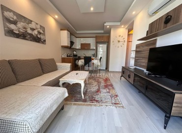 Furnished one-bedroom apartment 50 m2, with a glazed balcony, ready to move in, Mahmutlar, Alanya ID-13706 фото-6