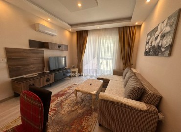 Furnished one-bedroom apartment 50 m2, with a glazed balcony, ready to move in, Mahmutlar, Alanya ID-13706 фото-8
