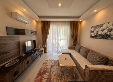 Furnished one-bedroom apartment 50 m2, with a glazed balcony, ready to move in, Mahmutlar, Alanya ID-13706 фото-9