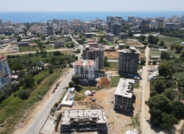 Attractive investment project in installments, 55-100m2, in a residence with facilities, Mahmutlar, Alanya ID-13707 фото-16