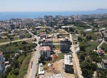 Attractive investment project in installments, 55-100m2, in a residence with facilities, Mahmutlar, Alanya ID-13707 фото-18