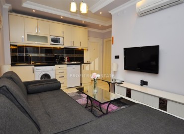 Меблированная квартира с одной спальней, 55м², в центре Алании в комплексе с бассейном ID-11363 фото-11