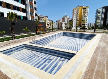 Apartment 2+1, 100 m² in a residence with a good location at the commissioning stage in the Yenisehir area, Ciftlikkoy ID-13721 фото-4