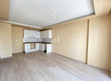 Двухкомнатные апартаменты, 55м², в доме городского типа в районе Томюк, Мерсин, по привлекательной цене ID-13727 фото-3