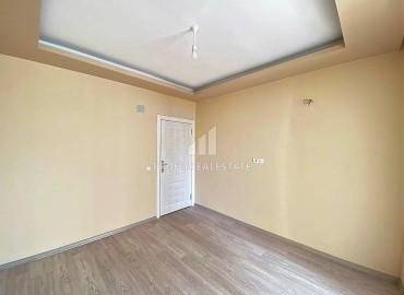 Двухкомнатные апартаменты, 55м², в доме городского типа в районе Томюк, Мерсин, по привлекательной цене ID-13727 фото-11