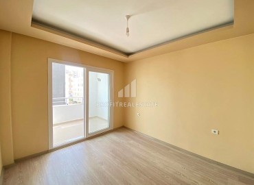 Двухкомнатные апартаменты, 55м², в доме городского типа в районе Томюк, Мерсин, по привлекательной цене ID-13727 фото-12