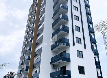 Стильная трехкомнатная квартира, 105м², в 550м от моря в Мерсине, район Каргыпынары ID-13745 фото-1