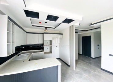 Стильная трехкомнатная квартира, 105м², в 550м от моря в Мерсине, район Каргыпынары ID-13745 фото-13