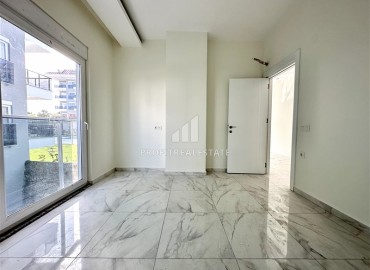 Двухкомнатные апартаменты 55м2, в новостройке, с чистовой отделкой и кухонным гарнитуром, в 300 метрах от моря в Кестеле, Аланья ID-13768 фото-8