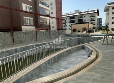 New one bedroom apartment in a residence with developed facilities, 200 meters from the center of Mahmutlar, Alanya, 60 m2 ID-13780 фото-15
