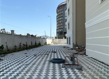 Новые двухкомнатные апартаменты в резиденции с развитой инфраструктурой, в 200 метрах от центра Махмутлара, Аланья, 60 м2 ID-13780 фото-17