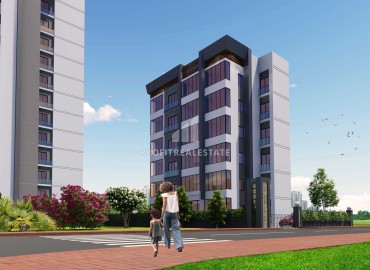 Комфортабельные двухкомнатные квартиры, 60-69м², в комплексе на этапе строительства в 200м от моря в районе Мерсина - Тедже. ID-13807 фото-4