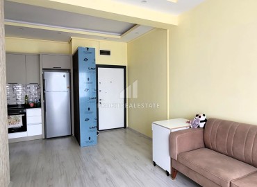 Furnished two bedroom apartment, 90m², in a new residence with a swimming pool, in the area of Mersin - Mezitli ID-13233 фото-7