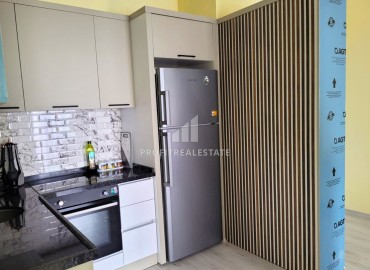 Furnished two bedroom apartment, 90m², in a new residence with a swimming pool, in the area of Mersin - Mezitli ID-13233 фото-8