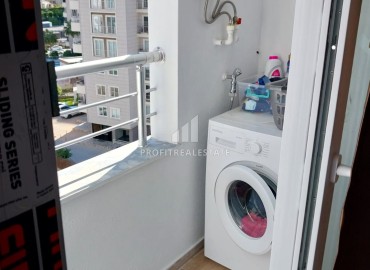 Furnished two bedroom apartment, 90m², in a new residence with a swimming pool, in the area of Mersin - Mezitli ID-13233 фото-16