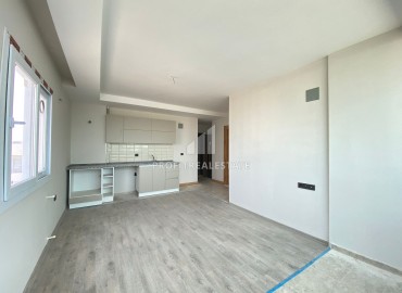 One-bedroom apartment, 55m², in a gasified new building in Mezitli district, Mersin, Kuyuluk microdistrict ID-13810 фото-7