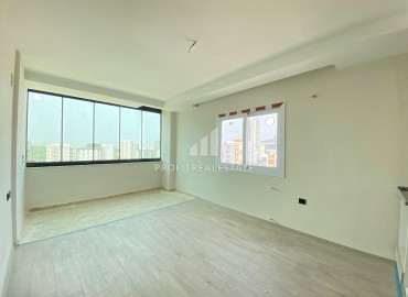 One-bedroom apartment, 55m², in a gasified new building in Mezitli district, Mersin, Kuyuluk microdistrict ID-13810 фото-11