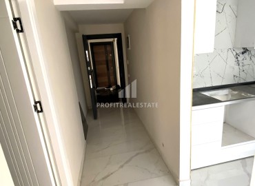 One bedroom apartment, 55m², with a fine finish in a new residence in Mezitli, Mersin, 450m from the sea ID-13811 фото-3