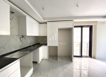 One bedroom apartment, 55m², with a fine finish in a new residence in Mezitli, Mersin, 450m from the sea ID-13811 фото-5