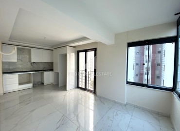 One bedroom apartment, 55m², with a fine finish in a new residence in Mezitli, Mersin, 450m from the sea ID-13811 фото-7
