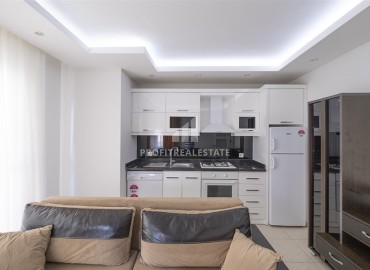 Cozy furnished one-bedroom apartment, 50m², in the center of Alanya in a residence with a swimming pool ID-13813 фото-7