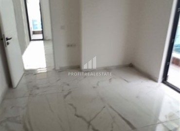 Spacious one-bedroom apartment 81 m2, in a new building, unfurnished, 500 meters from the sea, in Mahmutlar, Alanya ID-13820 фото-8