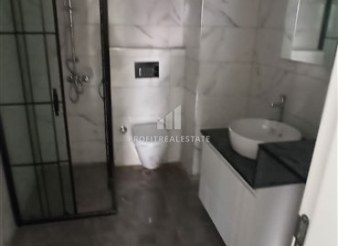 Spacious one-bedroom apartment 81 m2, in a new building, unfurnished, 500 meters from the sea, in Mahmutlar, Alanya ID-13820 фото-11