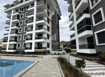 Двухкомнатная меблированная квартира, 50м², в новой резиденции с инфраструктурой с супер-локацией в Газипаше, Алания ID-13830 фото-1