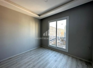 One-bedroom apartment, 55m², in a new urban-type building in Tomuk, Mersin ID-13845 фото-14