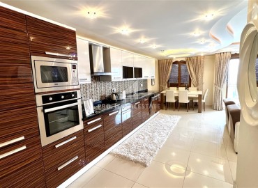 Stylish furnished apartment 2 + 1, 125 m2, with a glazed balcony and sea views, 100 meters from the beach, Mahmutlar, Alanya ID-13850 фото-2