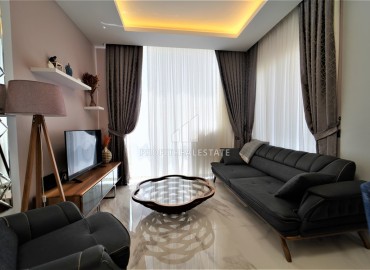 Luxury one-bedroom apartment 50 m2, with a stylish interior, sea views, 70 m from the beach, Kargicak, Alanya ID-13851 фото-2