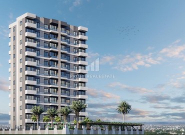 Двухкомнатные квартиры, 60м², в комплексе на этапе ввода в эксплуатацию в 500м от моря в Эрдемли, Арпачбахшиш ID-13868 фото-1