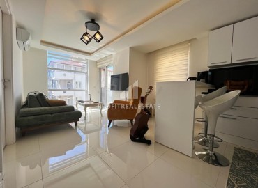 Ready-to-move one bedroom apartment in the center of Alanya and 150 meters from the sea, 55 m2 ID-13888 фото-1