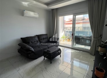 New one-bedroom apartment, 45m², in a residence with facilities, in Oba, Alanya, at the foot of the mountains ID-13892 фото-3
