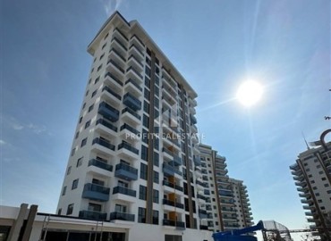 One-bedroom unfurnished apartment, 60 m2, unfurnished, in a new residence with facilities, Mahmutlar, Alanya ID-13895 фото-1