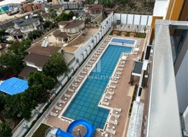 One-bedroom unfurnished apartment, 60 m2, unfurnished, in a new residence with facilities, Mahmutlar, Alanya ID-13895 фото-11