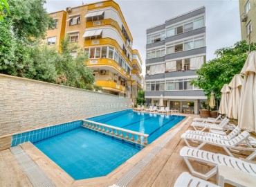 Элегантные меблированные двухкомнатные апартаменты 65м2 в жилом комплексе с бассейном в центре Аланьи ID-13897 фото-18