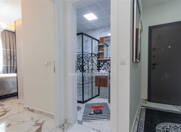 Фешенебельная двухкомнатная квартира 60 м2, с дизайнерским интерьером, Махмутлар, Аланья ID-13898 фото-3