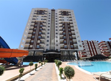 Ergonomic furnished apartment 1 + 1, 70 m2, with a glazed balcony, 300 meters from the sea, Mahmutlar, Alanya ID-13899 фото-1