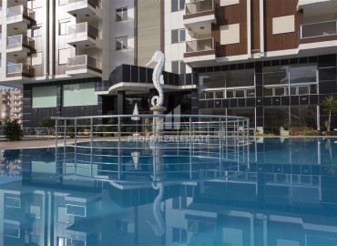 Ergonomic furnished apartment 1 + 1, 70 m2, with a glazed balcony, 300 meters from the sea, Mahmutlar, Alanya ID-13899 фото-16